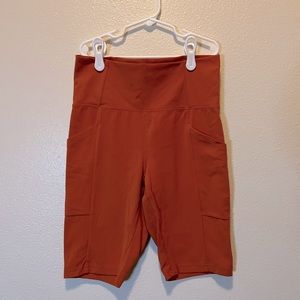 REI athletic shorts with pockets. Biker short length.